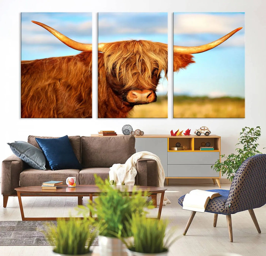 A triptych of Highland Cow Canvas Wall Art Print Cattle Art, featuring a shaggy-haired highland cow with long horns, elegantly adorns the space. Each museum-quality canvas piece is professionally hand-assembled and includes a UV-protective coating to maintain its vibrant colors over time.