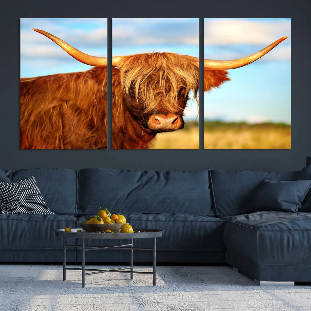 A triptych of Highland Cow Canvas Wall Art Print Cattle Art, featuring a shaggy-haired highland cow with long horns, elegantly adorns the space. Each museum-quality canvas piece is professionally hand-assembled and includes a UV-protective coating to maintain its vibrant colors over time.