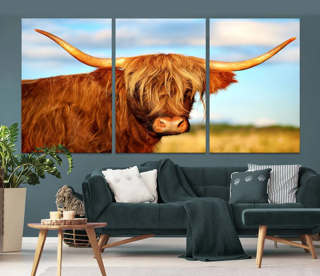 A triptych of Highland Cow Canvas Wall Art Print Cattle Art, featuring a shaggy-haired highland cow with long horns, elegantly adorns the space. Each museum-quality canvas piece is professionally hand-assembled and includes a UV-protective coating to maintain its vibrant colors over time.