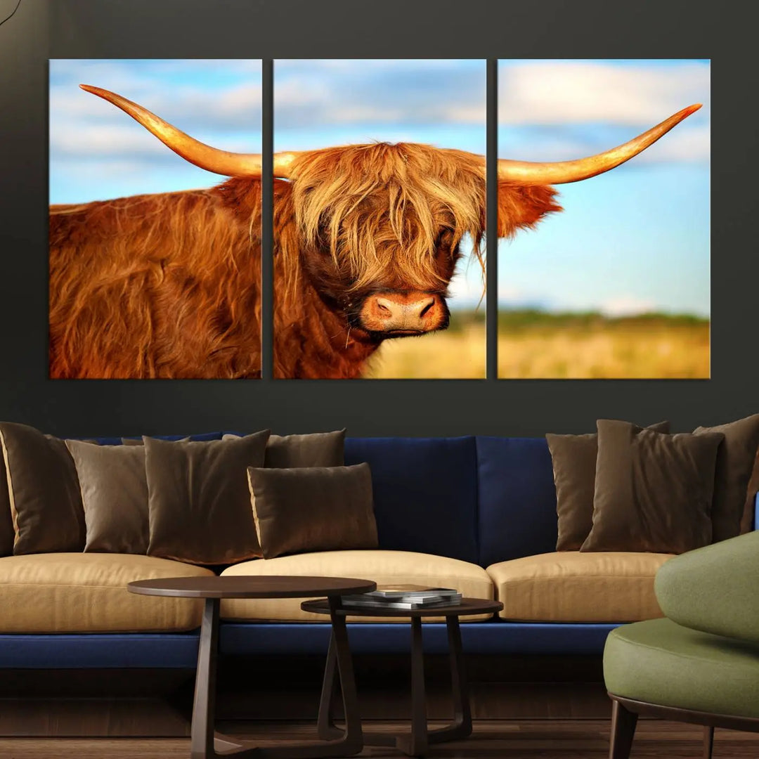 A triptych of Highland Cow Canvas Wall Art Print Cattle Art, featuring a shaggy-haired highland cow with long horns, elegantly adorns the space. Each museum-quality canvas piece is professionally hand-assembled and includes a UV-protective coating to maintain its vibrant colors over time.