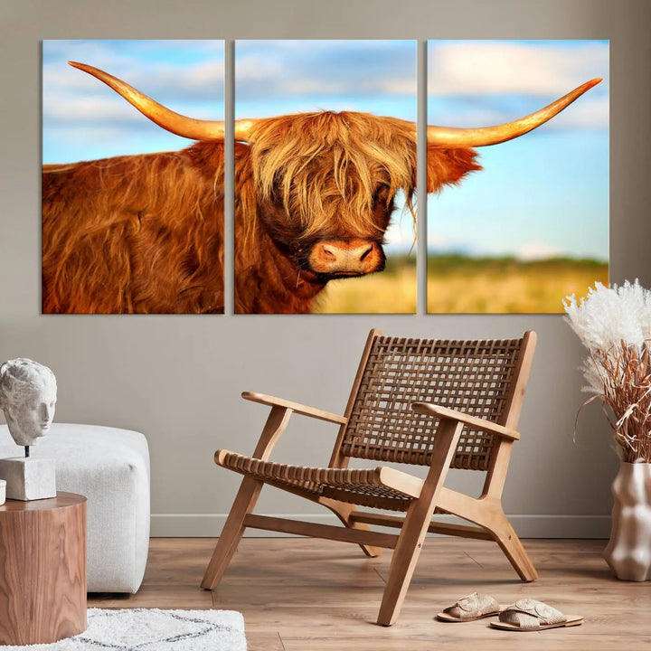 A triptych of Highland Cow Canvas Wall Art Print Cattle Art, featuring a shaggy-haired highland cow with long horns, elegantly adorns the space. Each museum-quality canvas piece is professionally hand-assembled and includes a UV-protective coating to maintain its vibrant colors over time.