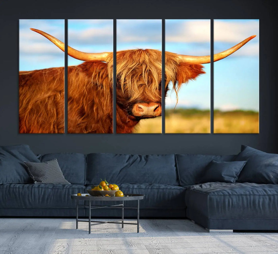 A triptych of Highland Cow Canvas Wall Art Print Cattle Art, featuring a shaggy-haired highland cow with long horns, elegantly adorns the space. Each museum-quality canvas piece is professionally hand-assembled and includes a UV-protective coating to maintain its vibrant colors over time.