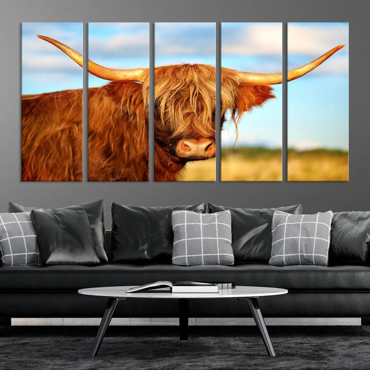 A triptych of Highland Cow Canvas Wall Art Print Cattle Art, featuring a shaggy-haired highland cow with long horns, elegantly adorns the space. Each museum-quality canvas piece is professionally hand-assembled and includes a UV-protective coating to maintain its vibrant colors over time.