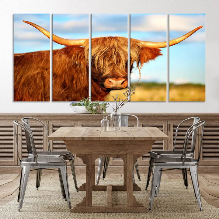 A triptych of Highland Cow Canvas Wall Art Print Cattle Art, featuring a shaggy-haired highland cow with long horns, elegantly adorns the space. Each museum-quality canvas piece is professionally hand-assembled and includes a UV-protective coating to maintain its vibrant colors over time.