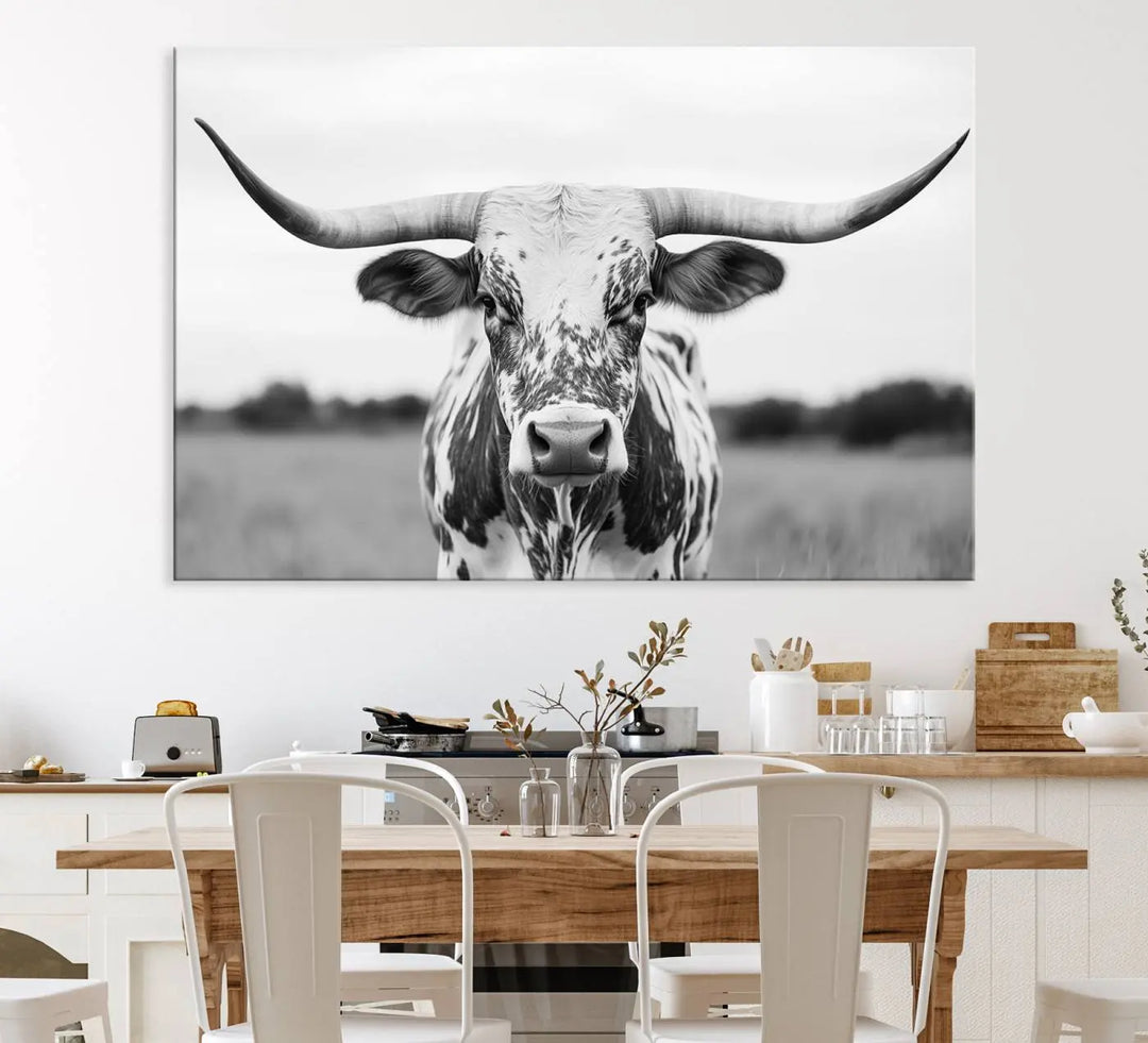 The Highland Cow Wall Art - Black & White Longhorn Canvas Print elevates farmhouse decor with its striking presence.