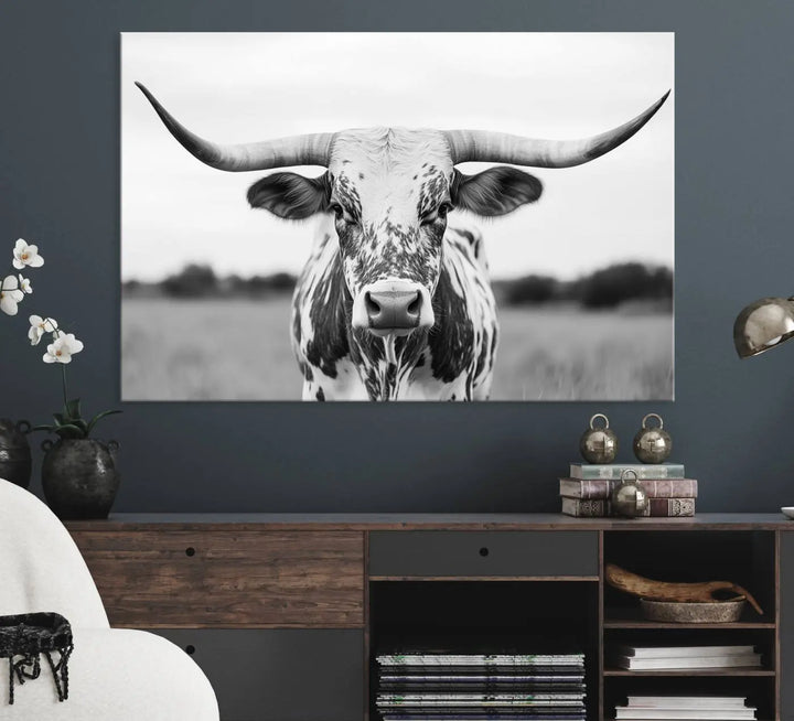 The Highland Cow Wall Art - Black & White Longhorn Canvas Print elevates farmhouse decor with its striking presence.