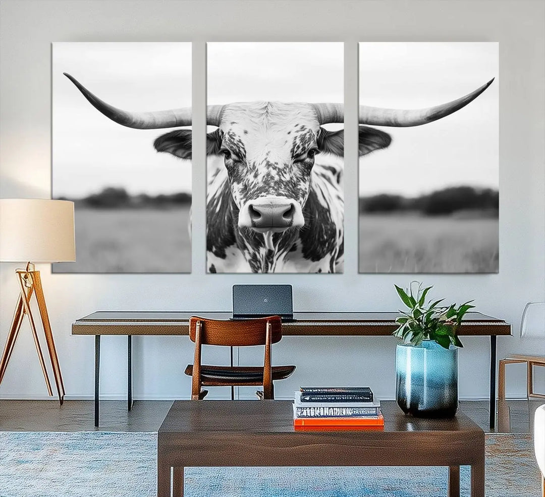 The Highland Cow Wall Art - Black & White Longhorn Canvas Print elevates farmhouse decor with its striking presence.