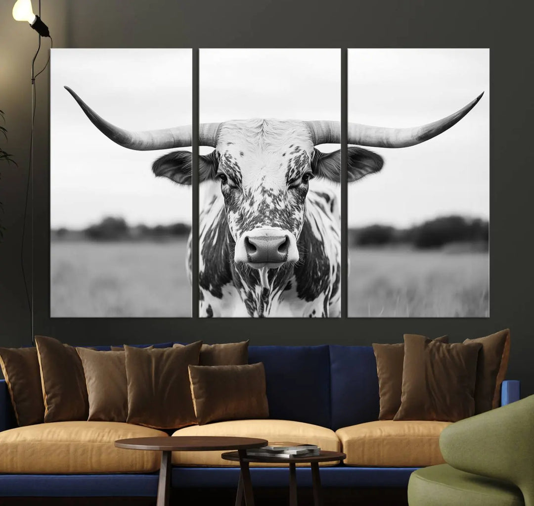 The Highland Cow Wall Art - Black & White Longhorn Canvas Print elevates farmhouse decor with its striking presence.