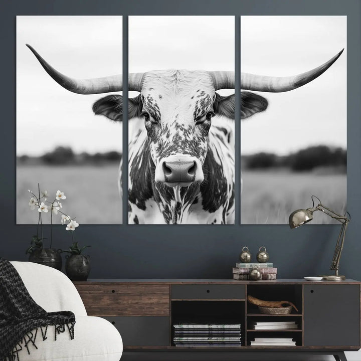 The Highland Cow Wall Art - Black & White Longhorn Canvas Print elevates farmhouse decor with its striking presence.