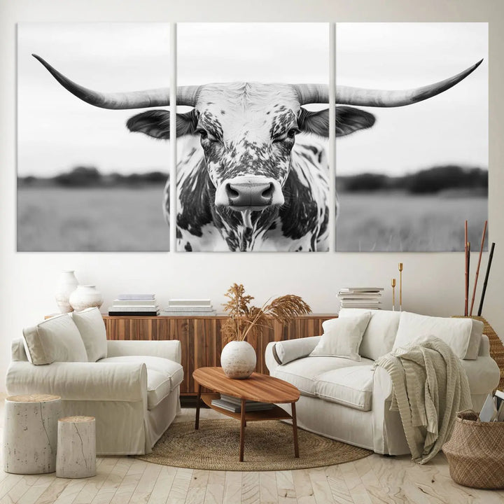 The Highland Cow Wall Art - Black & White Longhorn Canvas Print elevates farmhouse decor with its striking presence.