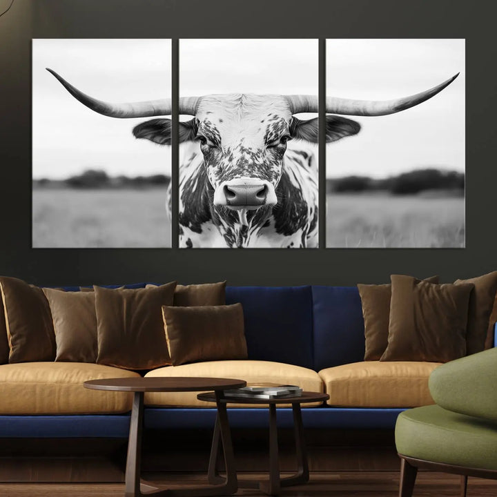 The Highland Cow Wall Art - Black & White Longhorn Canvas Print elevates farmhouse decor with its striking presence.