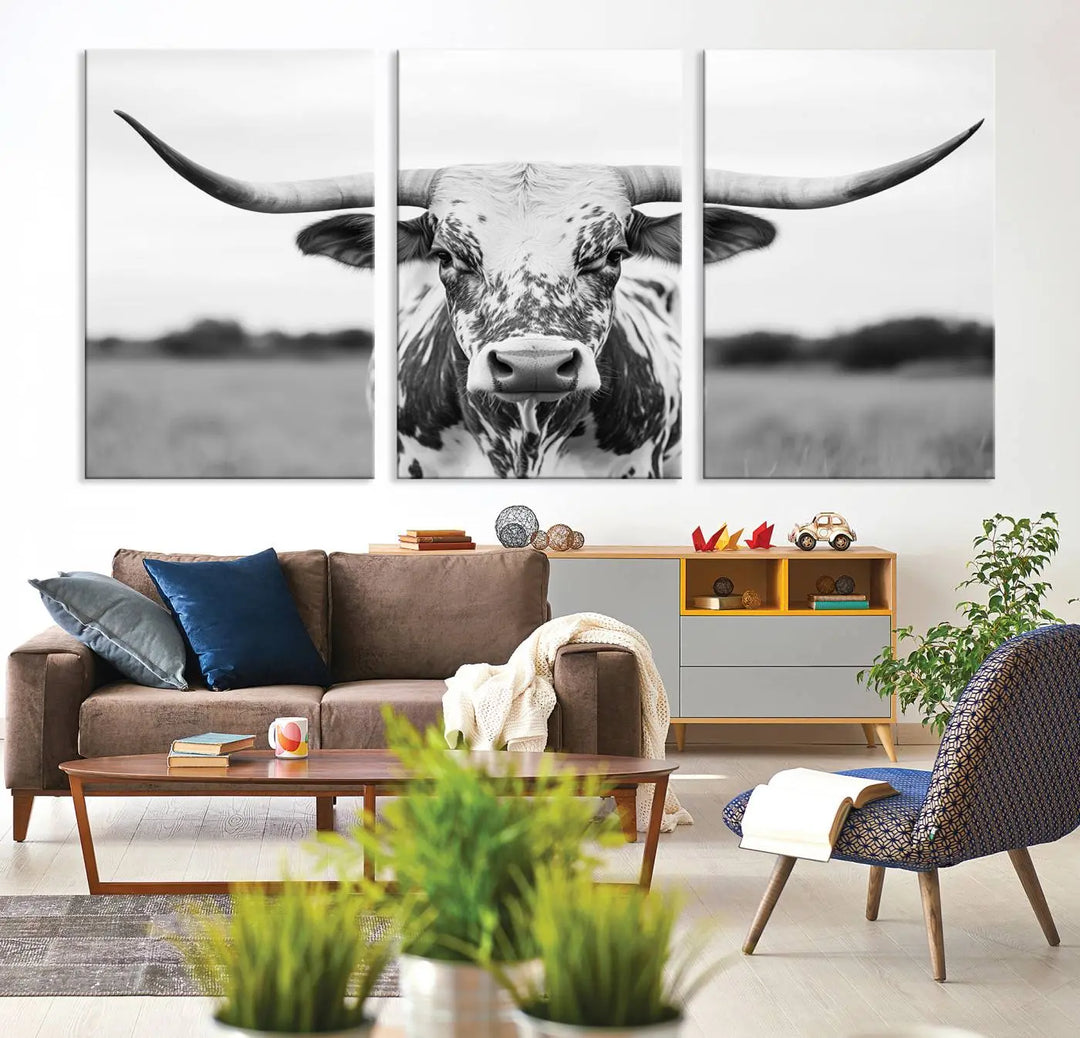 The Highland Cow Wall Art - Black & White Longhorn Canvas Print elevates farmhouse decor with its striking presence.