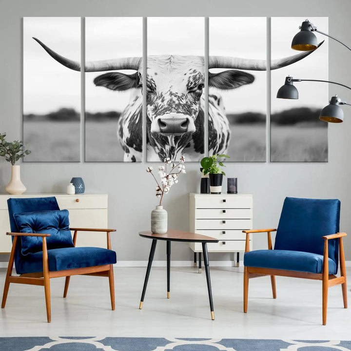 The Highland Cow Wall Art - Black & White Longhorn Canvas Print elevates farmhouse decor with its striking presence.