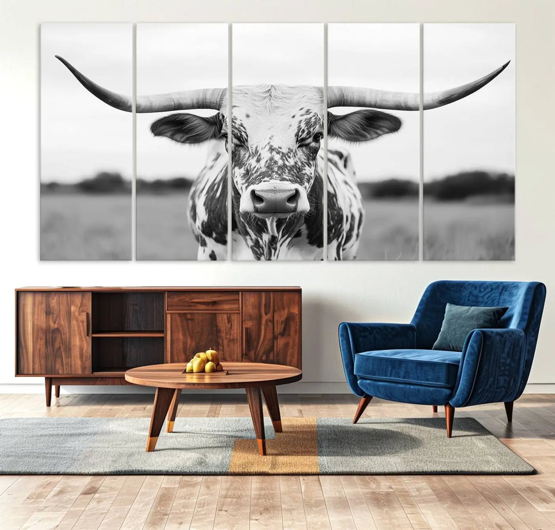 The Highland Cow Wall Art - Black & White Longhorn Canvas Print elevates farmhouse decor with its striking presence.