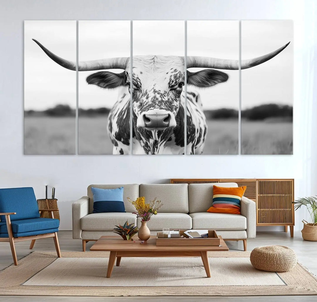 The Highland Cow Wall Art - Black & White Longhorn Canvas Print elevates farmhouse decor with its striking presence.