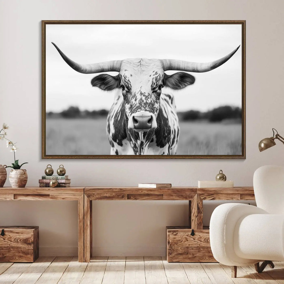 The Highland Cow Wall Art - Black & White Longhorn Canvas Print elevates farmhouse decor with its striking presence.