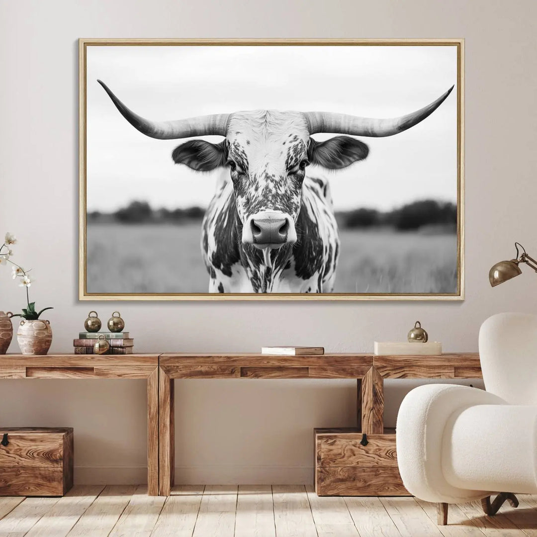 The Highland Cow Wall Art - Black & White Longhorn Canvas Print elevates farmhouse decor with its striking presence.