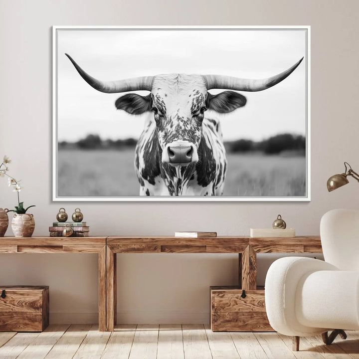 The Highland Cow Wall Art - Black & White Longhorn Canvas Print elevates farmhouse decor with its striking presence.