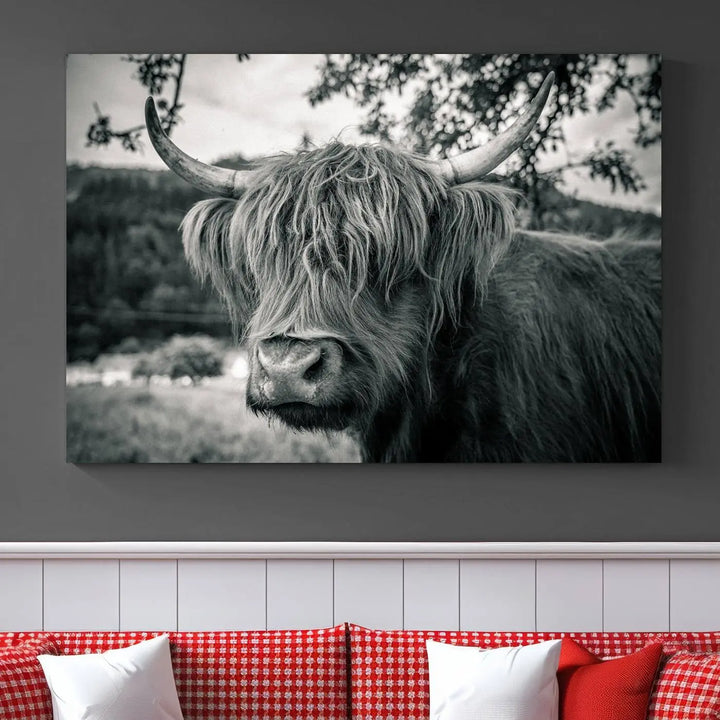 The stylish living room showcases the "Highland Cow Wall Art Canvas Print Scottish Cattle Canvas Art" displayed as a triptych on the wall. This artwork is gallery wrapped on museum-quality canvas with a UV-protective coating for lasting elegance.