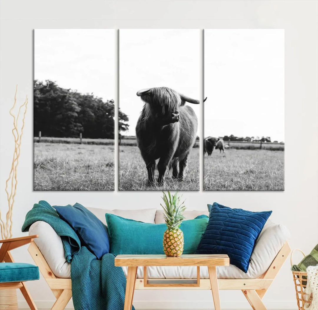 The Highland Cow Wall Art Canvas Print – Rustic Farmhouse Decor, ready to hang and split into three panels, adds charming rustic appeal.