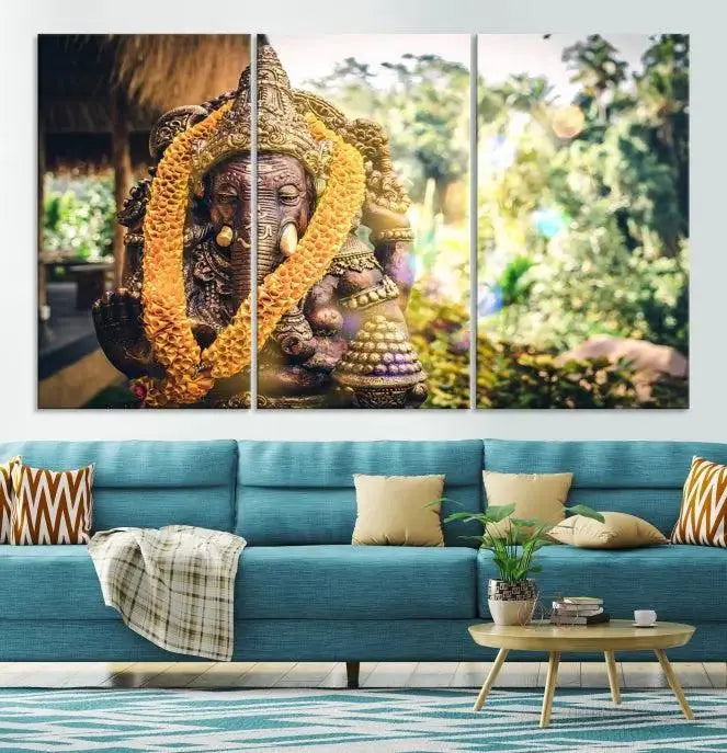 A set of three panels depicting the Hindu deity Lord Ganesha, embellished with a yellow garland, gracefully decorates a wall. This gallery-wrapped artwork, known as the Hinduism Statue Wall Art Canvas Print, is meticulously crafted on museum-quality canvas for an exquisite finish.