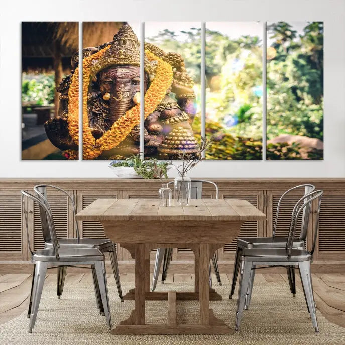 A set of three panels depicting the Hindu deity Lord Ganesha, embellished with a yellow garland, gracefully decorates a wall. This gallery-wrapped artwork, known as the Hinduism Statue Wall Art Canvas Print, is meticulously crafted on museum-quality canvas for an exquisite finish.