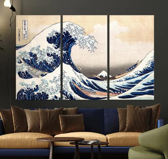 A triptych canvas print titled "Hokusai: The Breaking Wave off Kanagawa" in traditional Japanese style is elegantly displayed on museum-quality canvases with a UV-protective coating. Its blue and white hues are gallery wrapped, creating an artistic focal point.