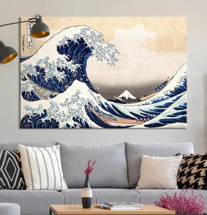 A triptych canvas print titled "Hokusai: The Breaking Wave off Kanagawa" in traditional Japanese style is elegantly displayed on museum-quality canvases with a UV-protective coating. Its blue and white hues are gallery wrapped, creating an artistic focal point.