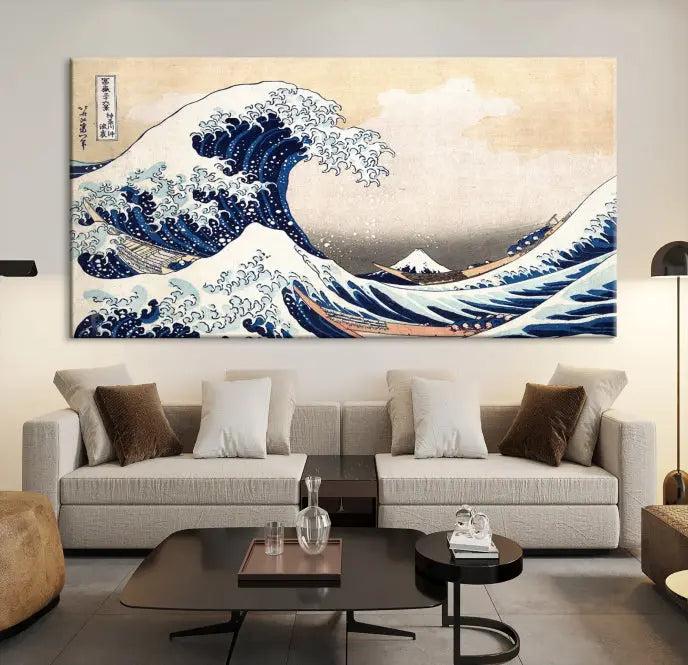 A triptych canvas print titled "Hokusai: The Breaking Wave off Kanagawa" in traditional Japanese style is elegantly displayed on museum-quality canvases with a UV-protective coating. Its blue and white hues are gallery wrapped, creating an artistic focal point.