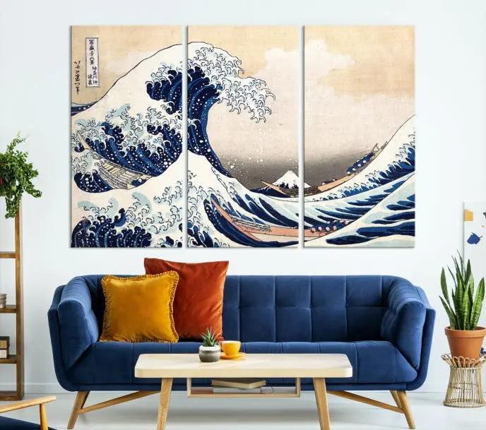 A triptych canvas print titled "Hokusai: The Breaking Wave off Kanagawa" in traditional Japanese style is elegantly displayed on museum-quality canvases with a UV-protective coating. Its blue and white hues are gallery wrapped, creating an artistic focal point.