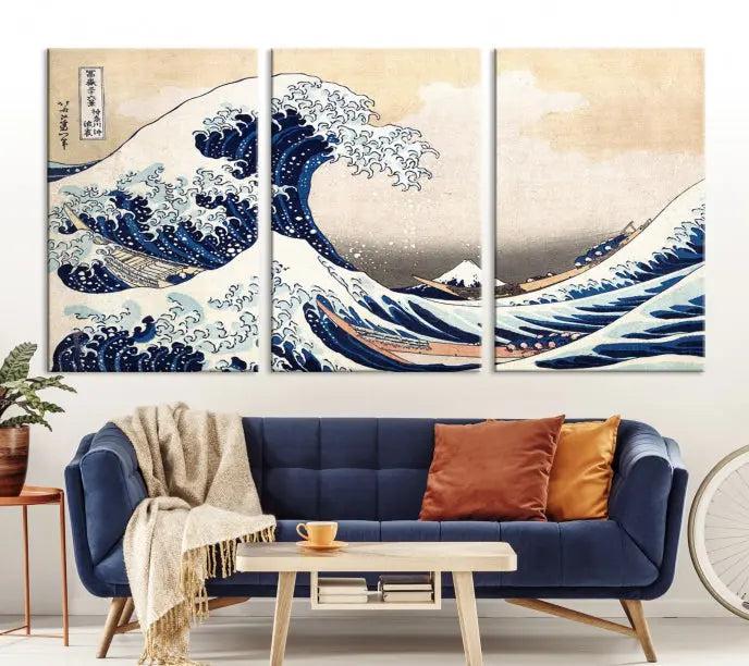 A triptych canvas print titled "Hokusai: The Breaking Wave off Kanagawa" in traditional Japanese style is elegantly displayed on museum-quality canvases with a UV-protective coating. Its blue and white hues are gallery wrapped, creating an artistic focal point.