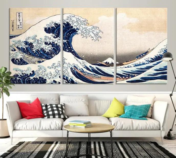 A triptych canvas print titled "Hokusai: The Breaking Wave off Kanagawa" in traditional Japanese style is elegantly displayed on museum-quality canvases with a UV-protective coating. Its blue and white hues are gallery wrapped, creating an artistic focal point.