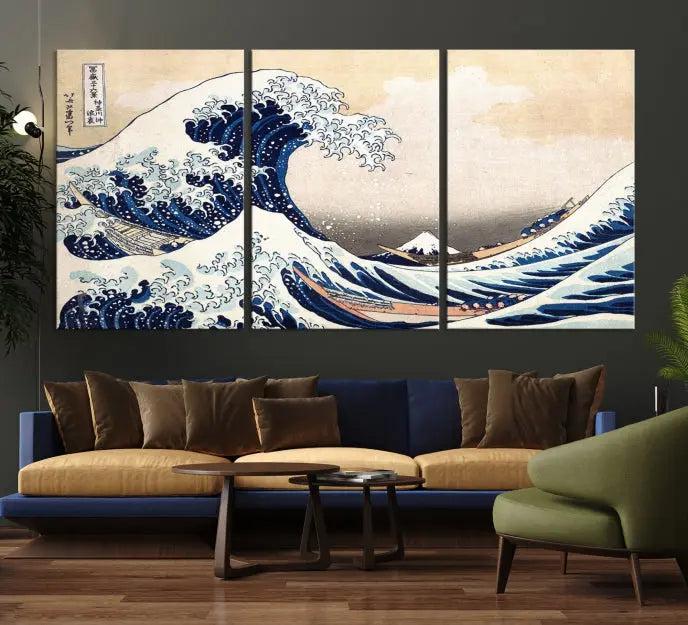 A triptych canvas print titled "Hokusai: The Breaking Wave off Kanagawa" in traditional Japanese style is elegantly displayed on museum-quality canvases with a UV-protective coating. Its blue and white hues are gallery wrapped, creating an artistic focal point.