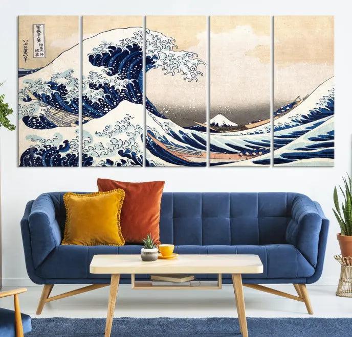 A triptych canvas print titled "Hokusai: The Breaking Wave off Kanagawa" in traditional Japanese style is elegantly displayed on museum-quality canvases with a UV-protective coating. Its blue and white hues are gallery wrapped, creating an artistic focal point.