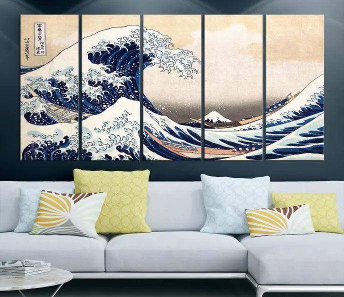 A triptych canvas print titled "Hokusai: The Breaking Wave off Kanagawa" in traditional Japanese style is elegantly displayed on museum-quality canvases with a UV-protective coating. Its blue and white hues are gallery wrapped, creating an artistic focal point.