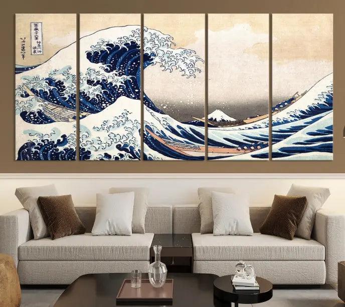 A triptych canvas print titled "Hokusai: The Breaking Wave off Kanagawa" in traditional Japanese style is elegantly displayed on museum-quality canvases with a UV-protective coating. Its blue and white hues are gallery wrapped, creating an artistic focal point.