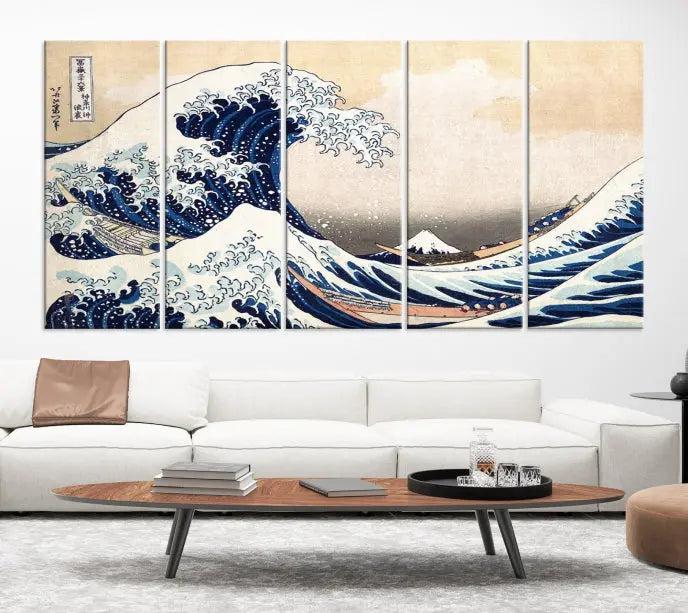 A triptych canvas print titled "Hokusai: The Breaking Wave off Kanagawa" in traditional Japanese style is elegantly displayed on museum-quality canvases with a UV-protective coating. Its blue and white hues are gallery wrapped, creating an artistic focal point.