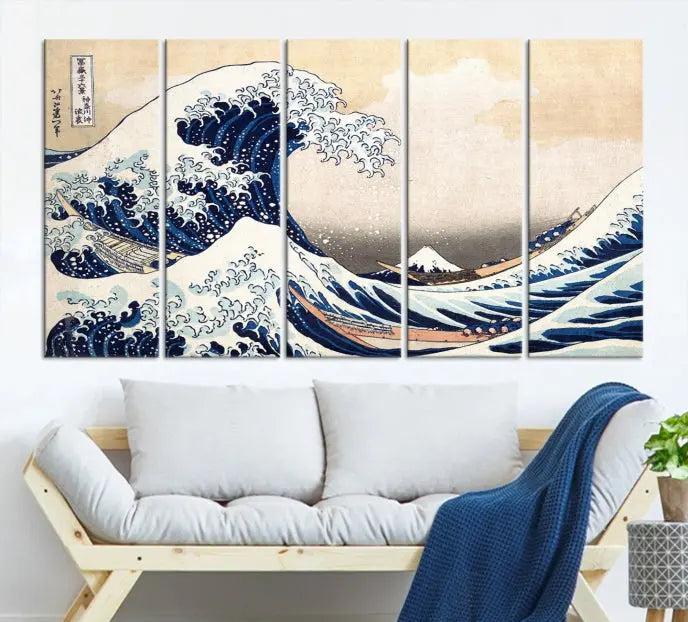 A triptych canvas print titled "Hokusai: The Breaking Wave off Kanagawa" in traditional Japanese style is elegantly displayed on museum-quality canvases with a UV-protective coating. Its blue and white hues are gallery wrapped, creating an artistic focal point.