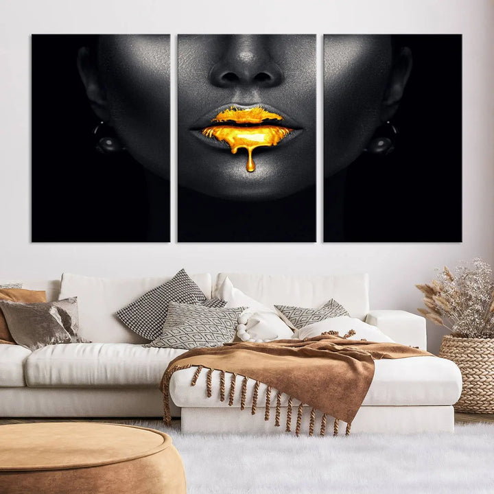 The modern living room showcases a Honey Gold Lips and Black Woman Photograph canvas print on the wall.