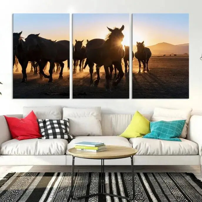 The Horse Herd Wall Art Animal Canvas Print features a triptych of galloping horses at sunset, hand-assembled on museum-quality canvas. This captivating masterpiece beautifully adorns the living room wall. Enjoy free shipping to easily welcome it into your home.