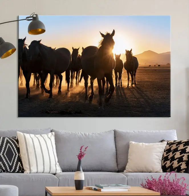 The Horse Herd Wall Art Animal Canvas Print features a triptych of galloping horses at sunset, hand-assembled on museum-quality canvas. This captivating masterpiece beautifully adorns the living room wall. Enjoy free shipping to easily welcome it into your home.