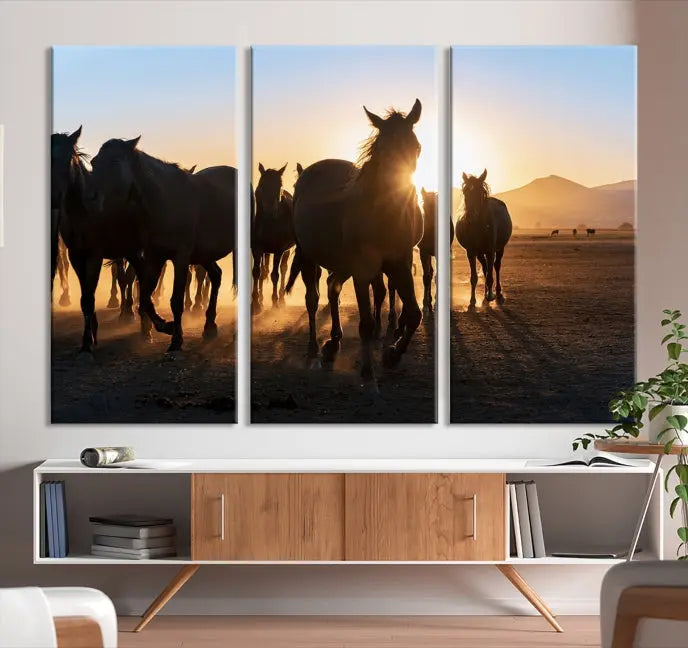 The Horse Herd Wall Art Animal Canvas Print features a triptych of galloping horses at sunset, hand-assembled on museum-quality canvas. This captivating masterpiece beautifully adorns the living room wall. Enjoy free shipping to easily welcome it into your home.