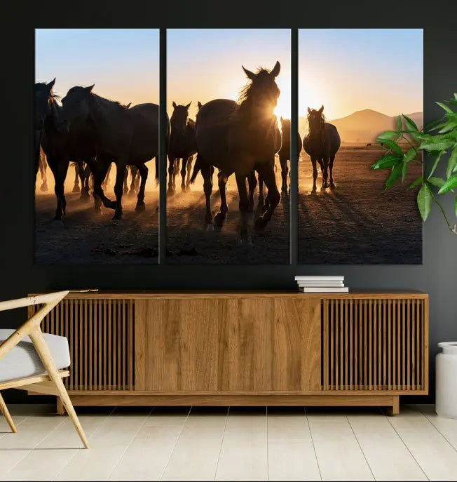 The Horse Herd Wall Art Animal Canvas Print features a triptych of galloping horses at sunset, hand-assembled on museum-quality canvas. This captivating masterpiece beautifully adorns the living room wall. Enjoy free shipping to easily welcome it into your home.