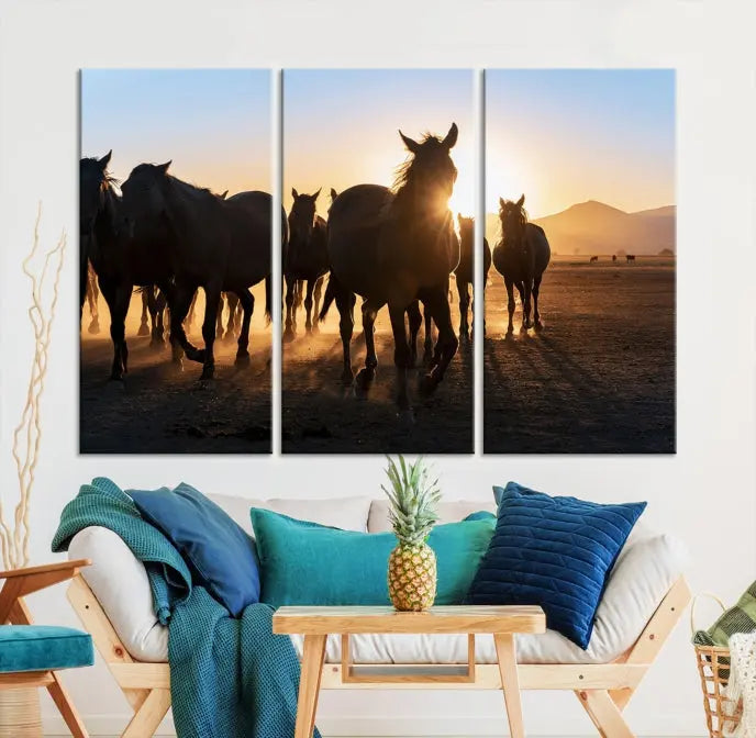 The Horse Herd Wall Art Animal Canvas Print features a triptych of galloping horses at sunset, hand-assembled on museum-quality canvas. This captivating masterpiece beautifully adorns the living room wall. Enjoy free shipping to easily welcome it into your home.