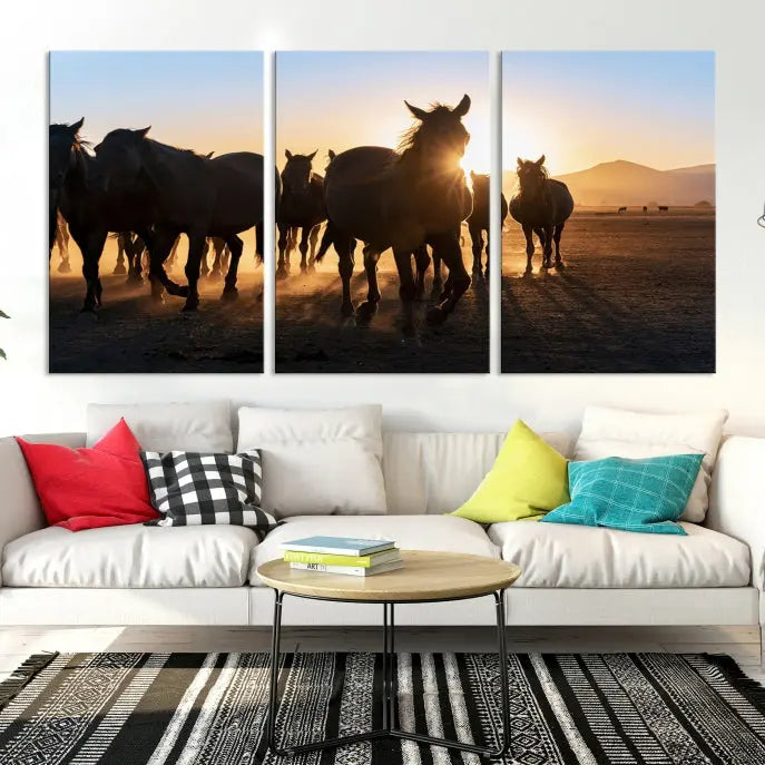 The Horse Herd Wall Art Animal Canvas Print features a triptych of galloping horses at sunset, hand-assembled on museum-quality canvas. This captivating masterpiece beautifully adorns the living room wall. Enjoy free shipping to easily welcome it into your home.