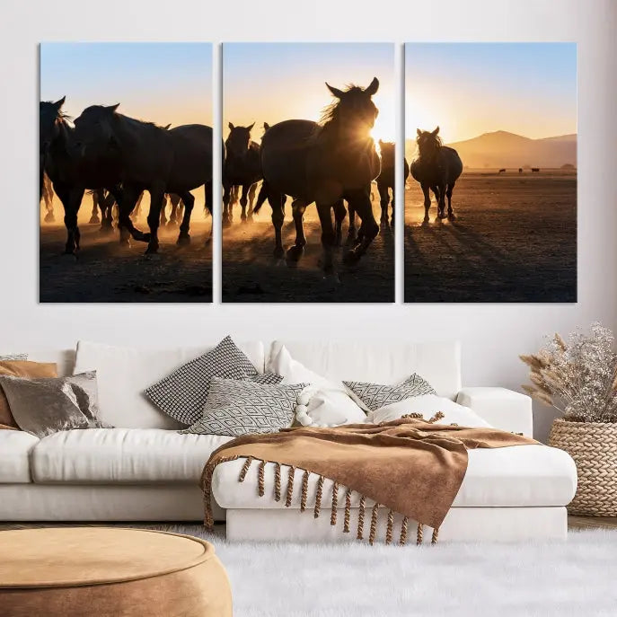 The Horse Herd Wall Art Animal Canvas Print features a triptych of galloping horses at sunset, hand-assembled on museum-quality canvas. This captivating masterpiece beautifully adorns the living room wall. Enjoy free shipping to easily welcome it into your home.