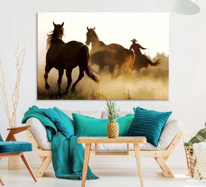 Introducing the "Horses and Cowboys Wall Art Canvas Print": a stunning three-panel artwork featuring horses and a rider, highlighted by the silhouette of a cowboy amidst a dusty sunset landscape. This masterpiece is crafted on museum-quality canvas, with each section gallery wrapped and finished with a UV-protective coating to maintain its vividness and elegance over time.