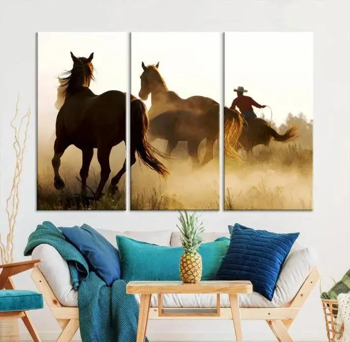 Introducing the "Horses and Cowboys Wall Art Canvas Print": a stunning three-panel artwork featuring horses and a rider, highlighted by the silhouette of a cowboy amidst a dusty sunset landscape. This masterpiece is crafted on museum-quality canvas, with each section gallery wrapped and finished with a UV-protective coating to maintain its vividness and elegance over time.