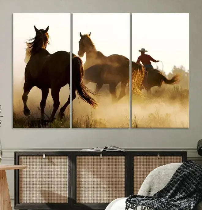 Introducing the "Horses and Cowboys Wall Art Canvas Print": a stunning three-panel artwork featuring horses and a rider, highlighted by the silhouette of a cowboy amidst a dusty sunset landscape. This masterpiece is crafted on museum-quality canvas, with each section gallery wrapped and finished with a UV-protective coating to maintain its vividness and elegance over time.