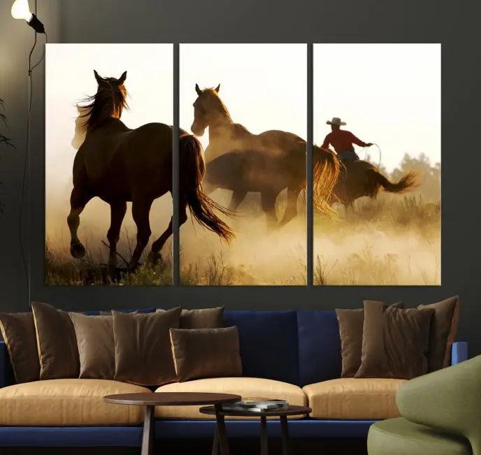 Introducing the "Horses and Cowboys Wall Art Canvas Print": a stunning three-panel artwork featuring horses and a rider, highlighted by the silhouette of a cowboy amidst a dusty sunset landscape. This masterpiece is crafted on museum-quality canvas, with each section gallery wrapped and finished with a UV-protective coating to maintain its vividness and elegance over time.